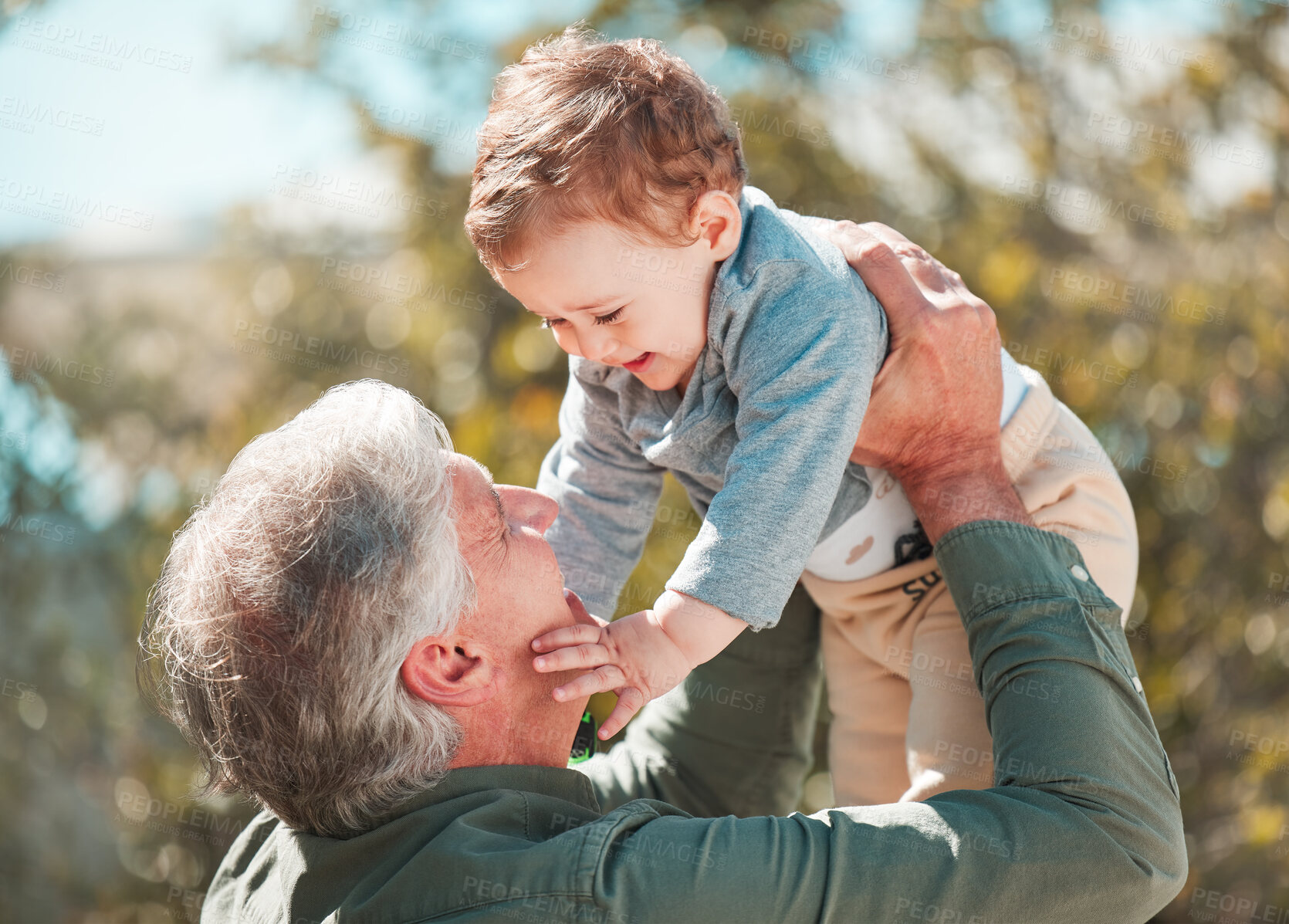 Buy stock photo Old man, child and grandfather playing in park, outdoor and support grandchild in relationship. Papa, boy and bonding together on holiday in Florence, love and weekend visit with kid on vacation