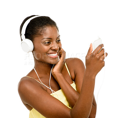 Buy stock photo Phone, music and happy black woman in studio for streaming subscription, playlist and radio. Relax, headphones and isolated person on cellphone listening to audio, song or podcast on white background