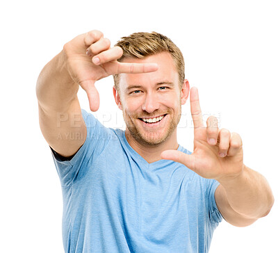 Buy stock photo Hands, frame and portrait of man in studio with smile for confidence, pride or positive attitude. Happy, finger and isolated person with gesture for photography, picture or selfie on white background