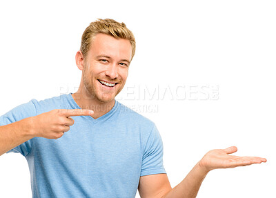 Buy stock photo Presentation, pointing and portrait of man in studio for promotion, news and announcement. Advertising, happy and isolated person with hand gesture for discount, deal and bargain on white background