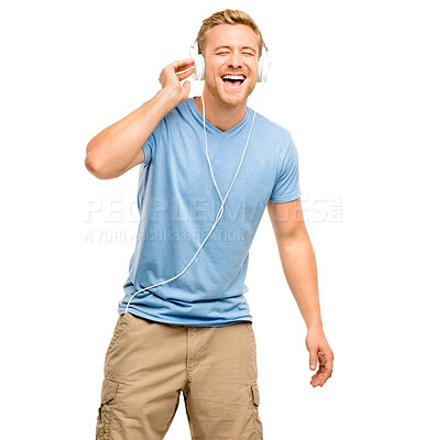 Buy stock photo Man, headphones and happy in studio with music, listening and singing lyrics by white background. Person, voice and audio tech for streaming, subscription and hearing with radio, playlist or song