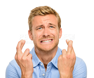 Buy stock photo Wish, fingers crossed and face of man on a white background with anxiety, worry and hope for news. Emoji, luck and isolated person with hand gesture, sign and anxious for announcement in studio