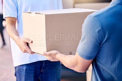 Buy stock photo Shot of a unrecognizable delivery man handing over a package to a client outside