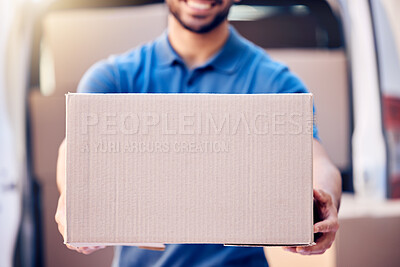 Buy stock photo Shot of a unrecognizable delivery man holding a pile of boxes