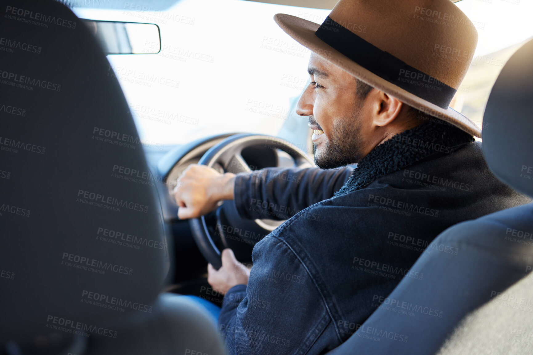 Buy stock photo Shot of a young man driving his car