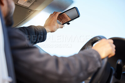 Buy stock photo Shot of a young man taking a selfie in his car