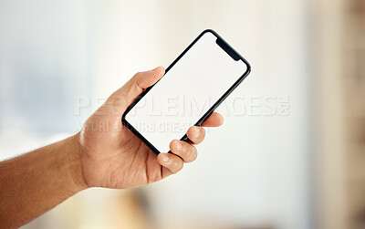 Buy stock photo Shot of an unrecognizable businessman using a phone in an office at work