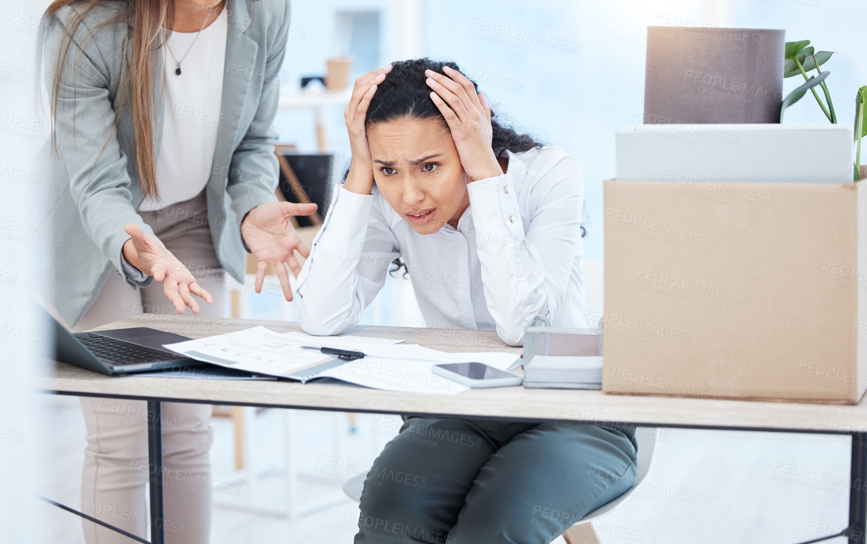 Buy stock photo Shot of a young businesswoman looking overwhelmed in an office at work