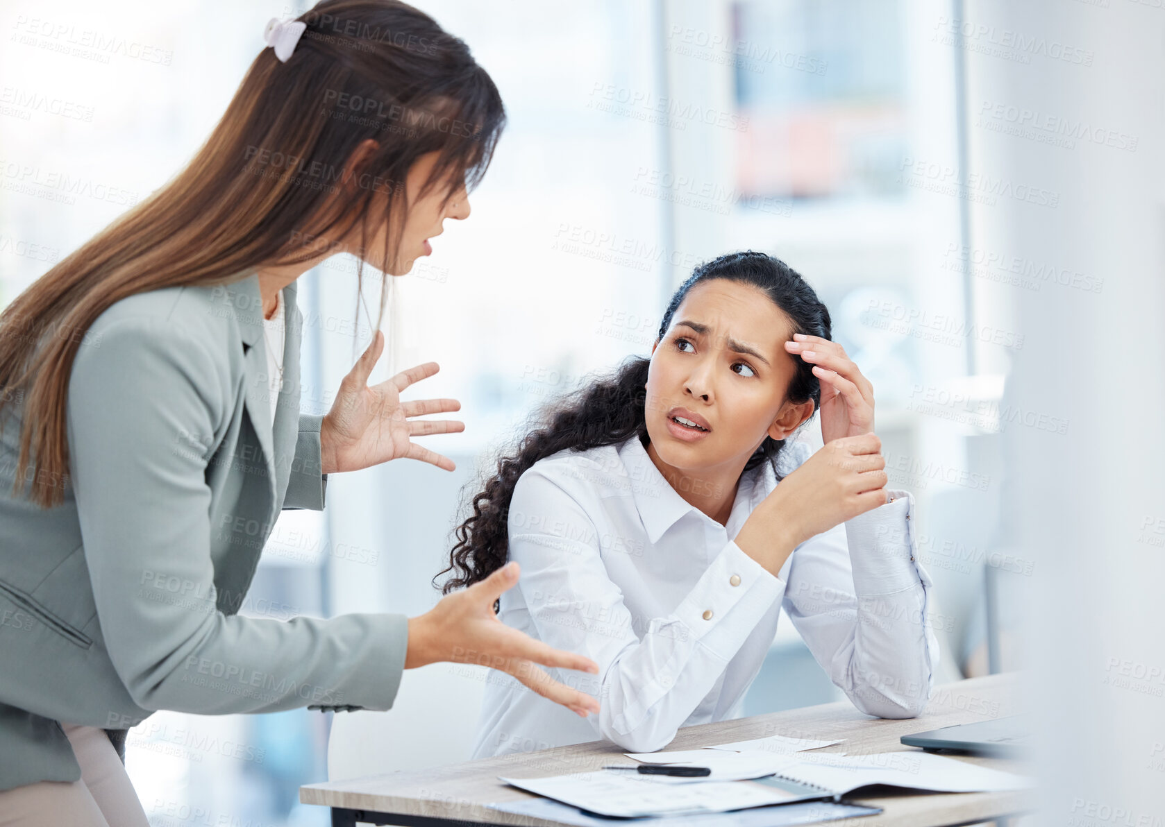 Buy stock photo Shot of a young businesswoman looking overwhelmed in an office at work