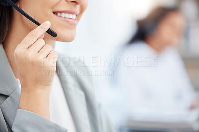 Buy stock photo Shot of an unrecognizable call center agent working in an office