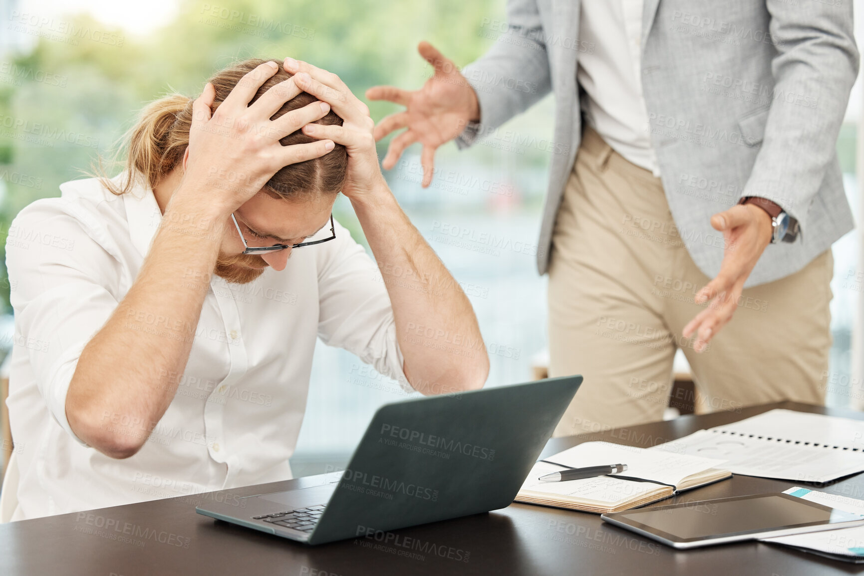 Buy stock photo Office, laptop and businessman with colleague for stress, overwhelmed and pressure of deadline for blog post. Computer, headache and migraine of male blogger with burnout, anxious and chaos of editor