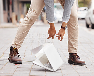 Buy stock photo Shot of an unrecognizable businessperson dropping a laptop on the floor