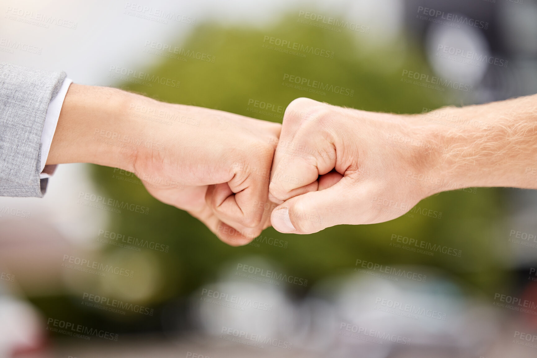 Buy stock photo Business people, hands and fist bump for agreement or partnership with support, collaboration and trust in city. Friends, teamwork and power sign together for solidarity, community and celebration