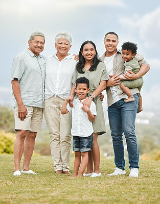 Buy stock photo Portrait, smile and family outdoor, love and carefree with happiness, cheerful and bonding together. Face, happy grandparents and mother with father, kids and children outside, freedom and loving