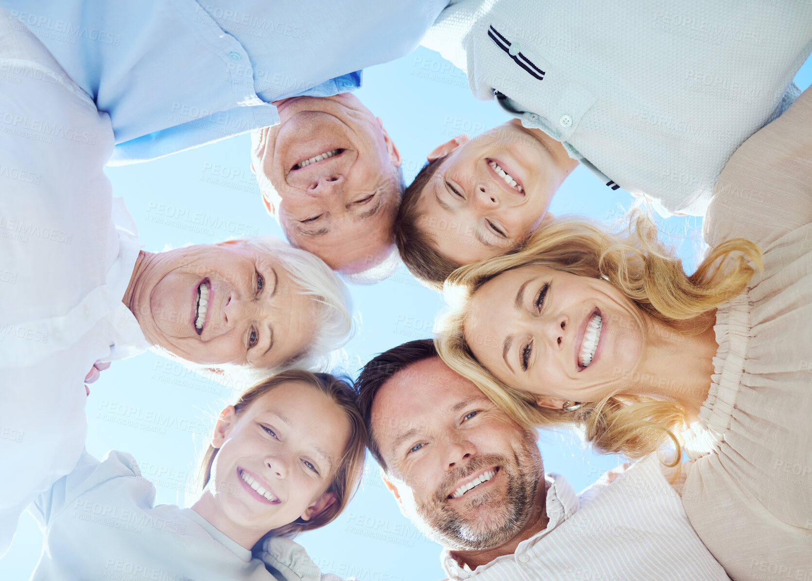 Buy stock photo Happy, huddle and care with portrait of family for support, summer holiday and love. Low angle, solidarity and vacation with group of people in nature for hug, bonding and community together