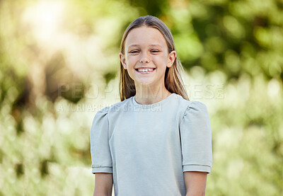 Buy stock photo Portrait, smile and girl in park, outdoor and happy in nature, fresh air and relax in morning and green. Spring, youth and child in environment, peace and kid in backyard, break and calm in weekend