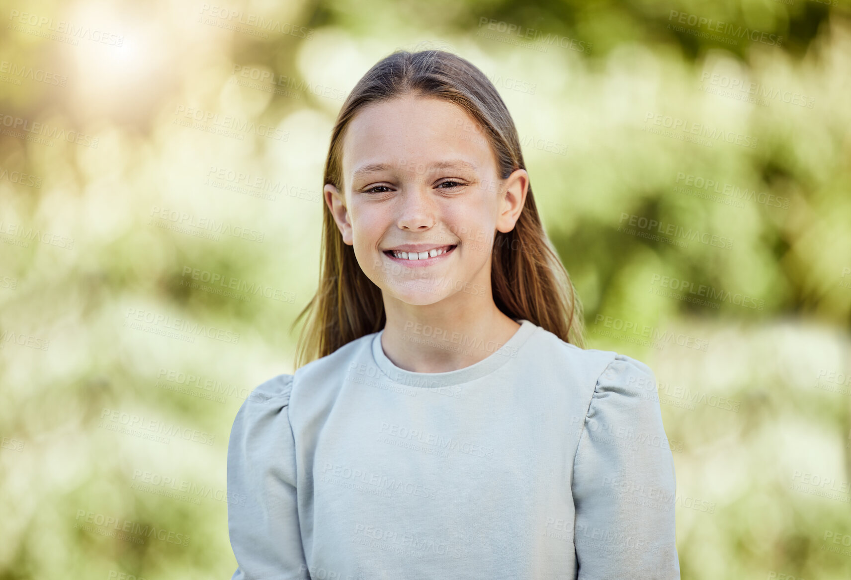 Buy stock photo Portrait, smile and child in park, outdoor and happy in nature, fresh air and relax in morning and plants. Spring, grass and girl in environment, peace and kid in backyard, break and calm in weekend