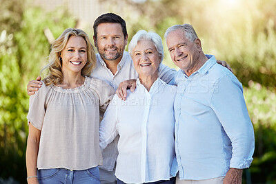 Buy stock photo Happy, hug and love with portrait of family in park for support, summer holiday and garden. Care, solidarity and vacation with group of people in nature for relax, bonding and community together