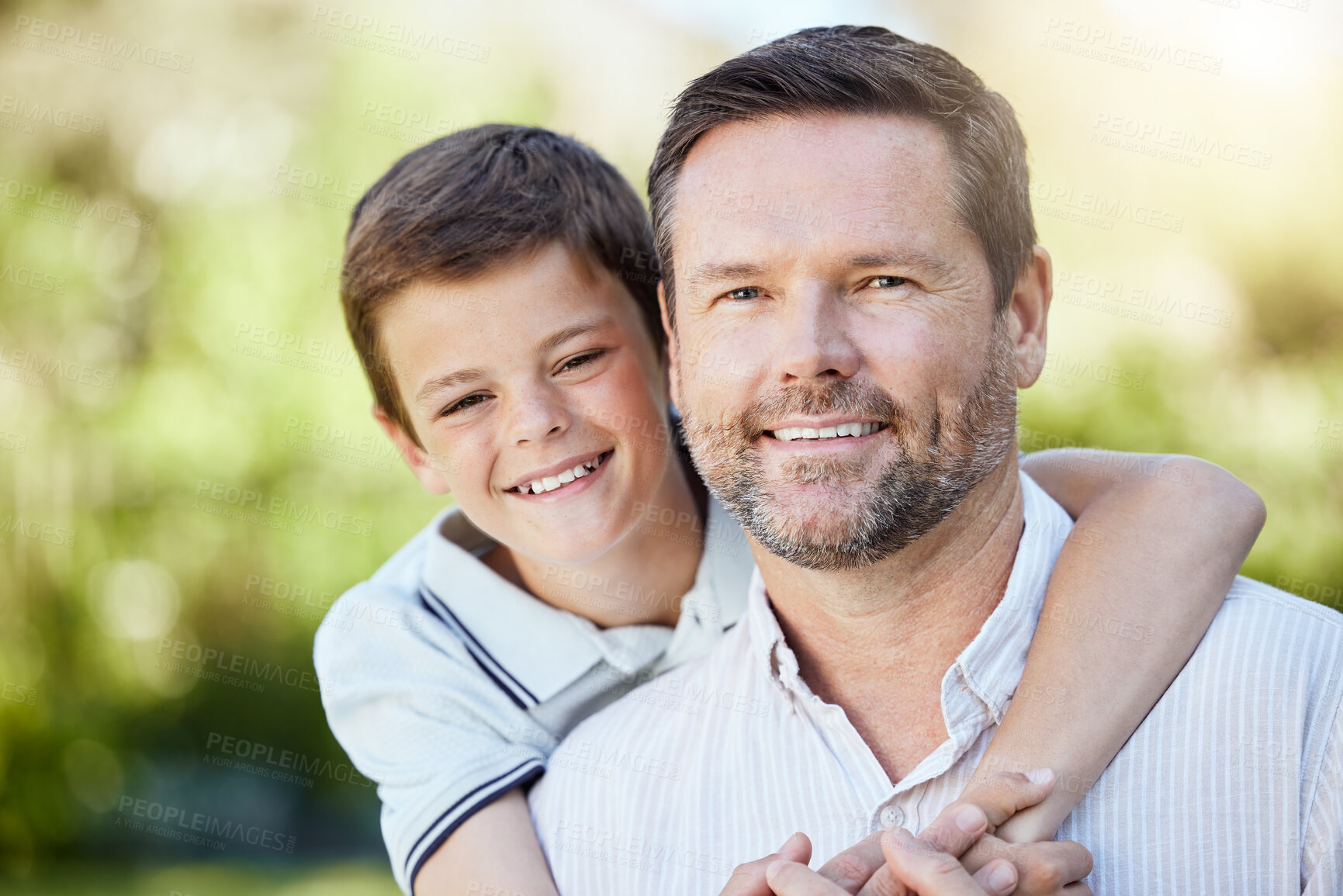 Buy stock photo Portrait, hug and child with father in nature for bonding, travel and adventure on vacation. Outdoor, happy and boy embrace dad in park for connection on holiday, getaway or weekend trip in Australia