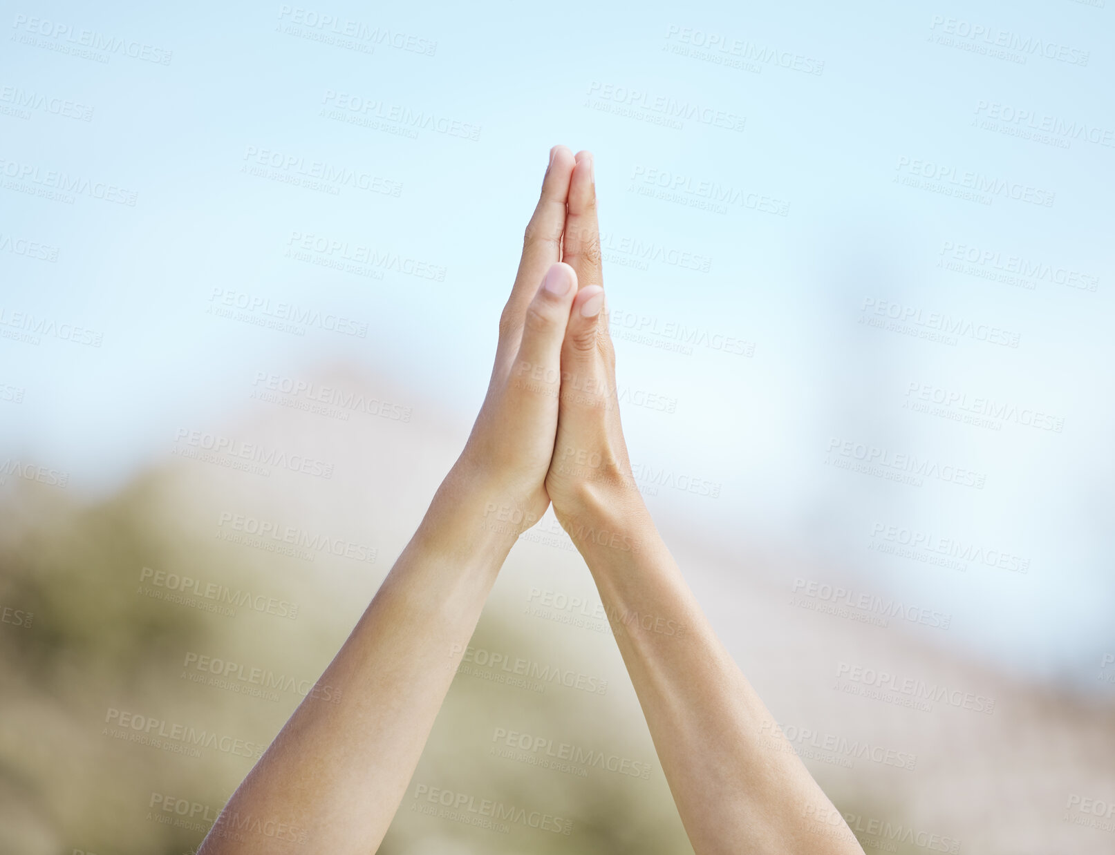 Buy stock photo Cropped shot of a young boy and girl giving each other a high-five while standing outside