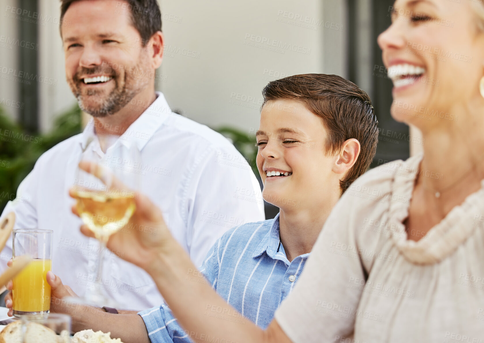 Buy stock photo Family, champagne and smile for celebration, food and gathering for thanksgiving, love and reunion. Outdoor, man and woman with wine, cheers and dinner in holiday, house and child with parents