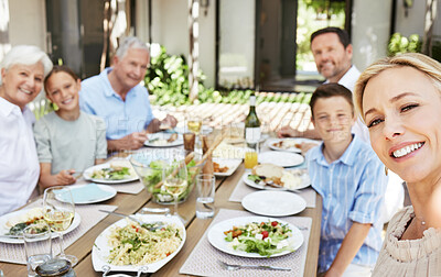 Buy stock photo Shot of a multi-generational family enjoying a meal together