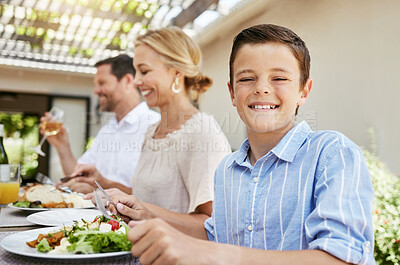 Buy stock photo Child, portrait and food with family in garden for Thanksgiving celebration, festive holiday and brunch. Support, love and party with group of people and lunch for nutrition, grateful and tradition