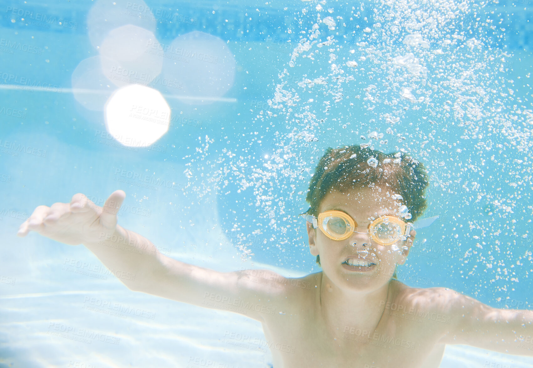 Buy stock photo Swimming, underwater and portrait of child in pool for summer vacation, learning and aquatic hobby. Bubble, energy and game with young boy and diving talent for exercise, wellness and holiday