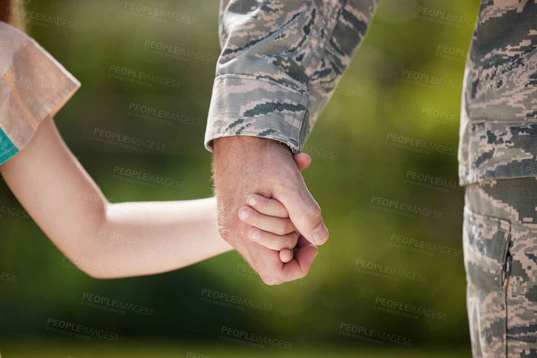 Buy stock photo Shot of a unrecognizable man holding his daughters hand outside