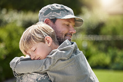 Buy stock photo Hug, soldier and love of child, nature and bonding with dad, reunion and return from military. Family, uniform and person with kid, outdoor and care of veteran, youth and father with support and army