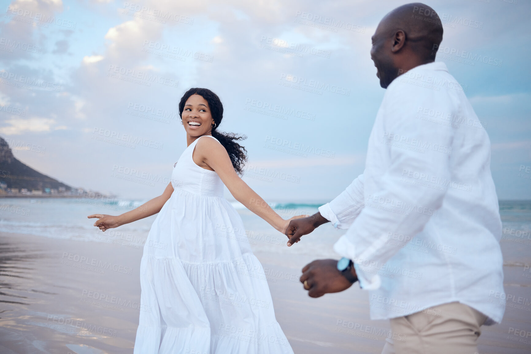 Buy stock photo Walking, honeymoon and black couple holding hands at beach for support, trust or travel together on date. Smile, sea and people romantic anniversary for holiday or marriage commitment in Mauritius 