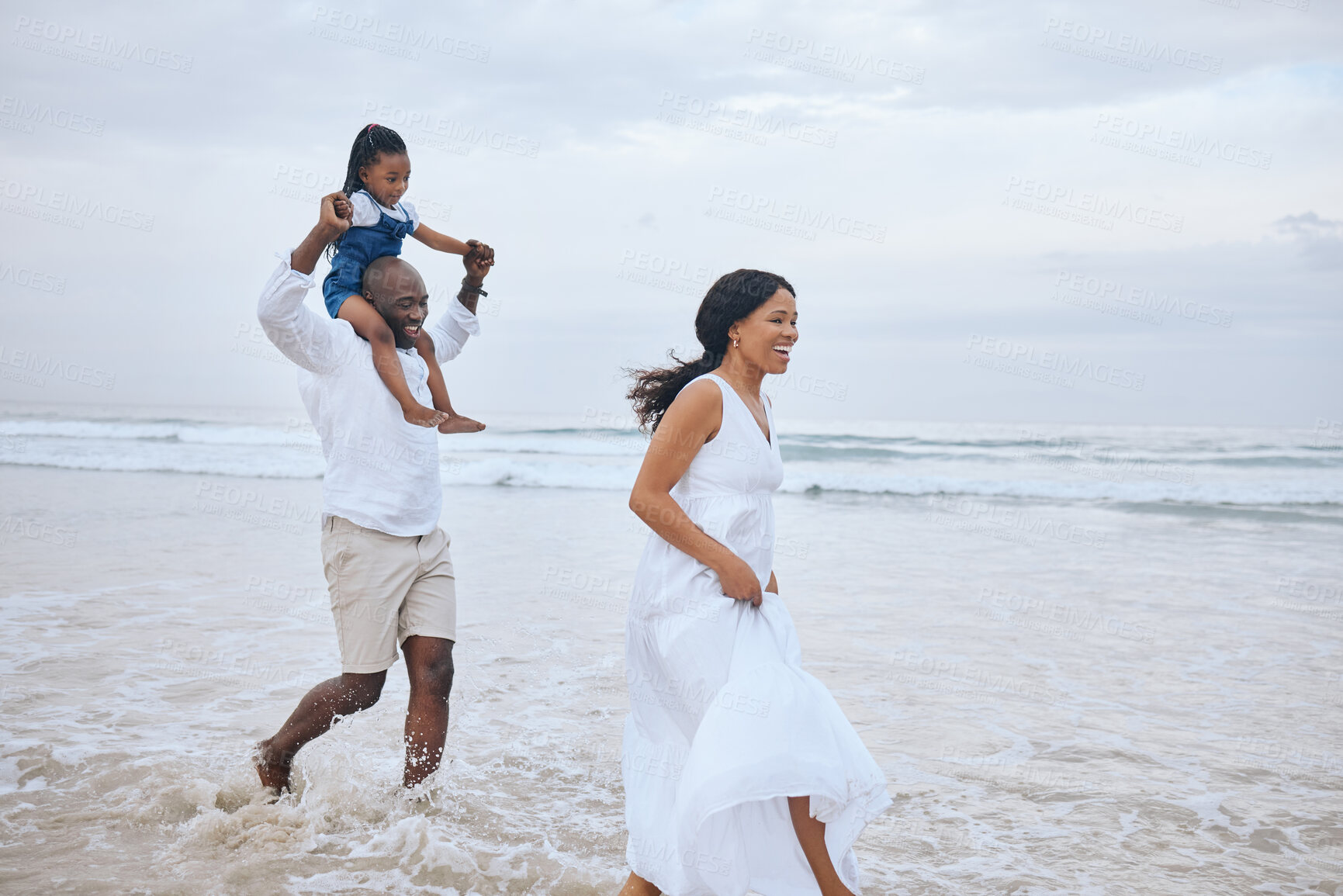 Buy stock photo Parents, child and bonding with daughter on shoulders for travel, holiday or fun in playing together. Beach, black family and vacation on weekend for adventure, freedom or nature in summer or outdoor