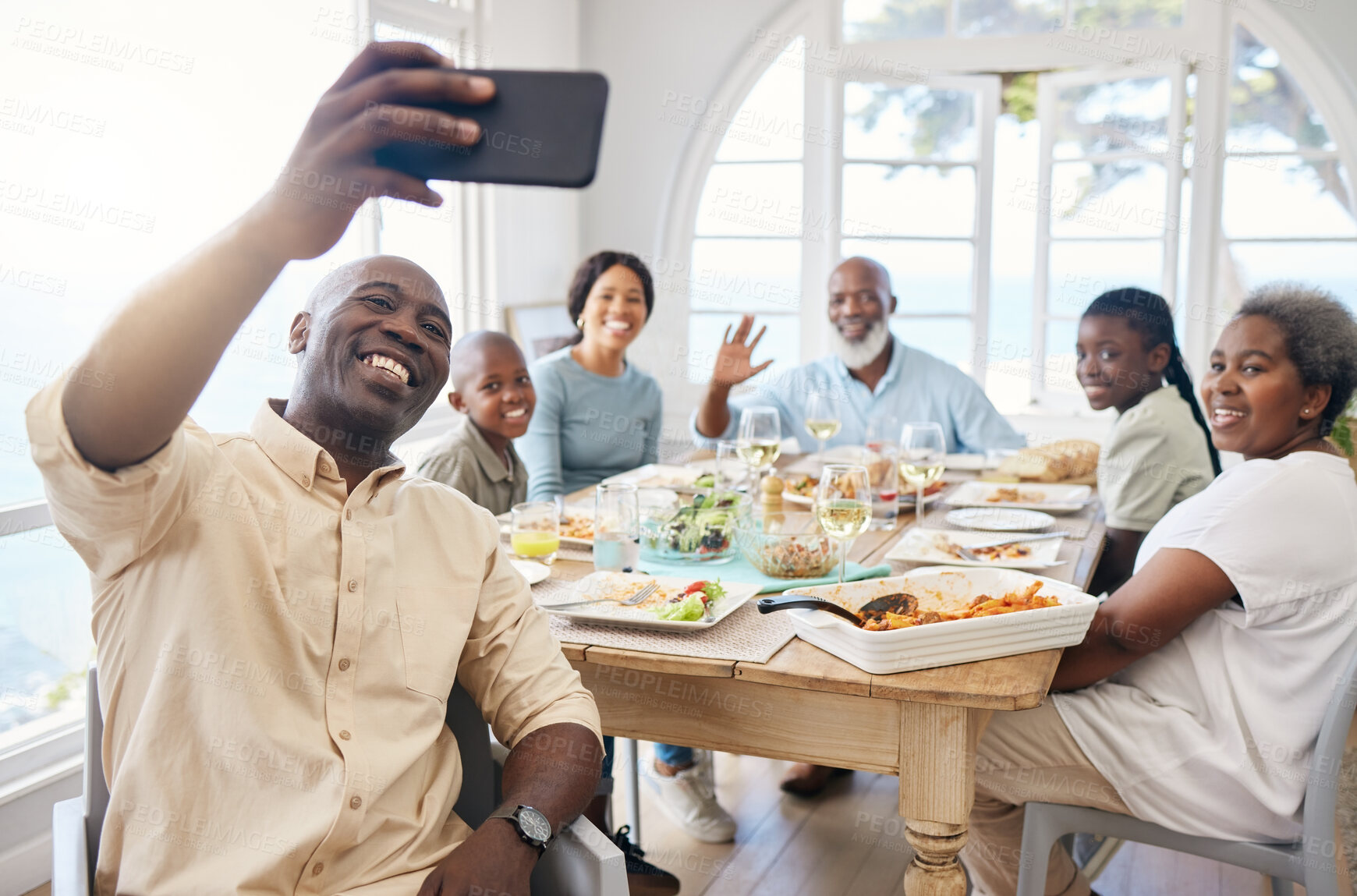 Buy stock photo Selfie, smile and food with black family in home for Thanksgiving celebration, festive holiday and brunch. Memory, love and photography with people and picture for nutrition, grateful and tradition