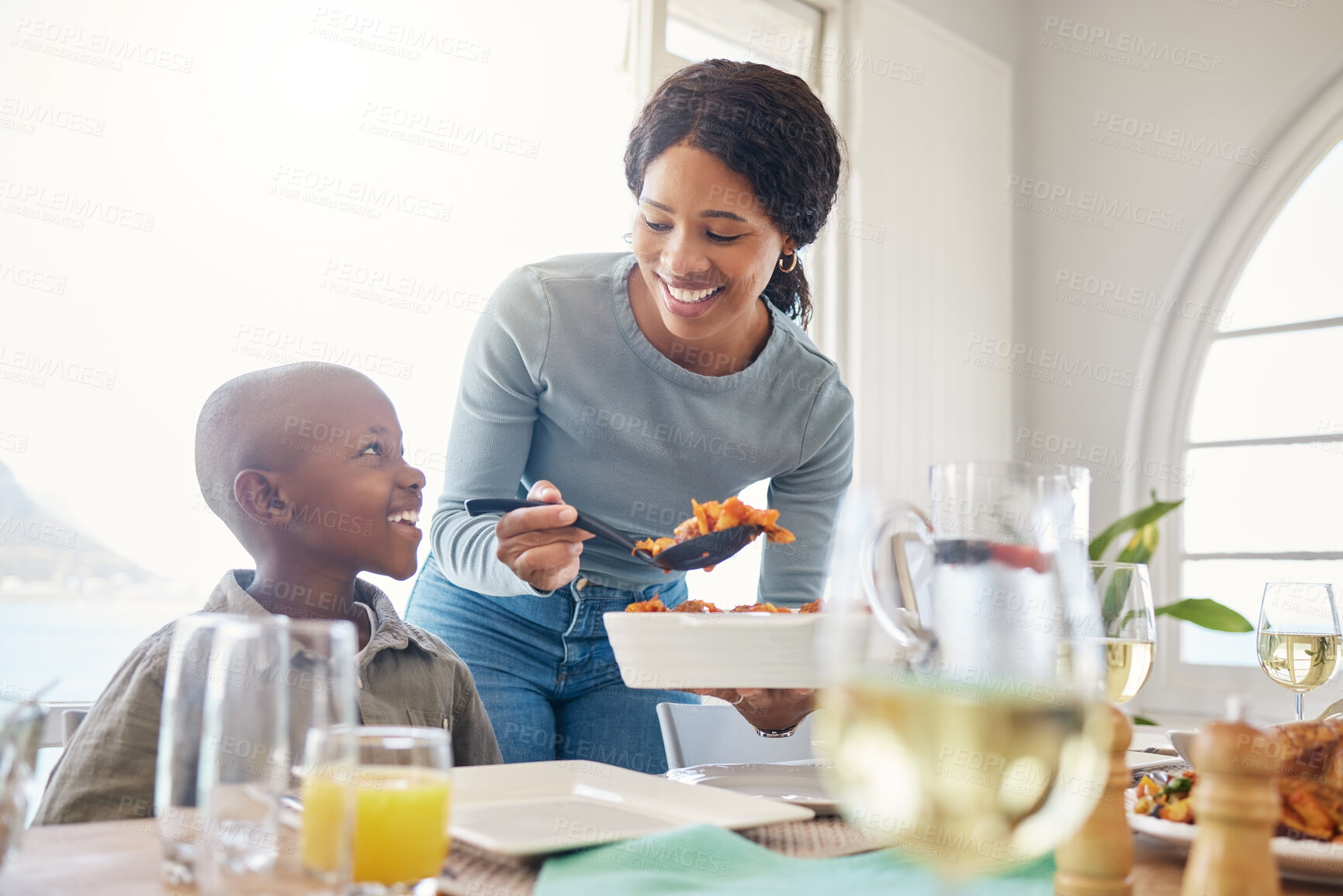 Buy stock photo Help, eating and food with black family in home for Thanksgiving celebration, festive holiday and brunch. Support, love and party with people and lunch for nutrition, grateful and tradition event