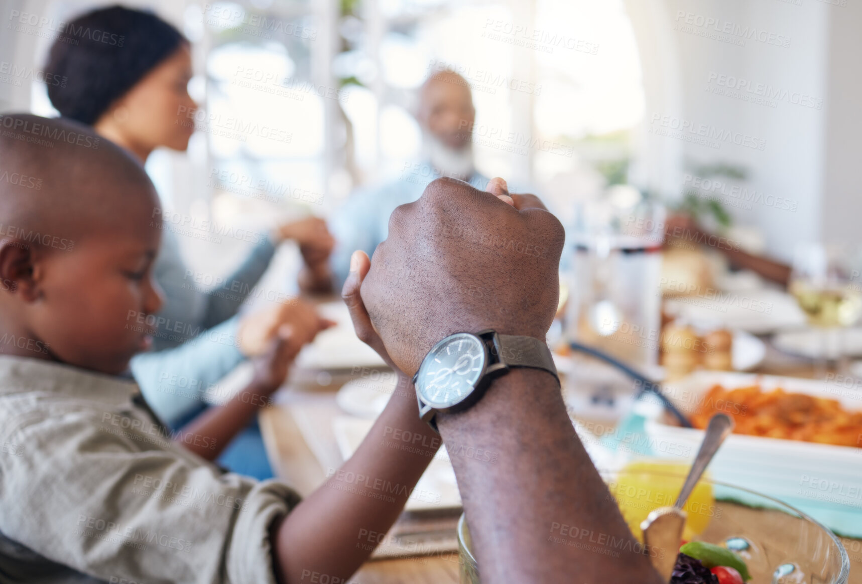 Buy stock photo Closeup, family and holding hands to pray for feast, gratitude and holiday brunch in home. Group, support or people at table together for sharing super, lunch or food in house for thanks and grace