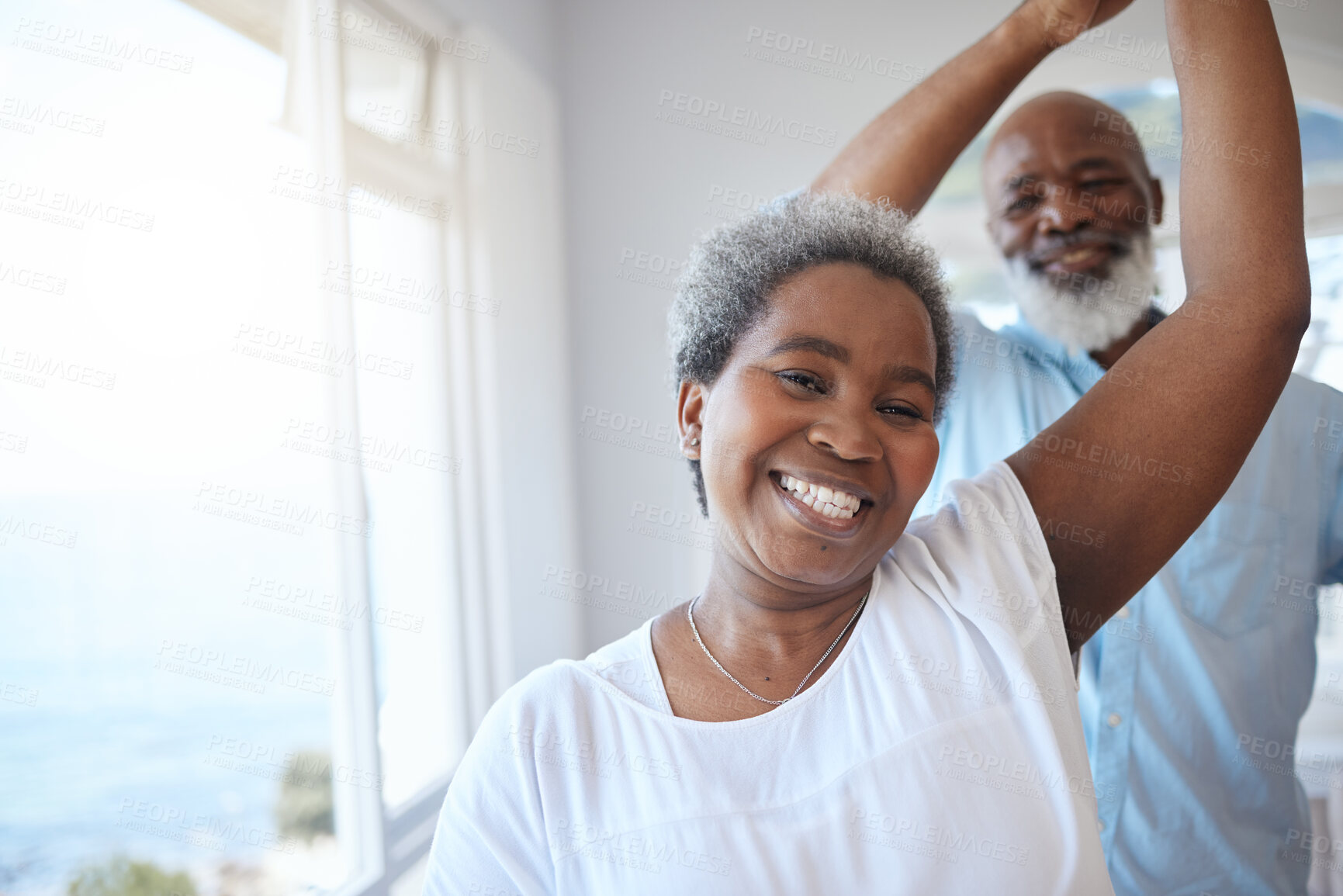 Buy stock photo Black senior couple, dancing and together in a happy home with love, care and commitment. Portrait of a african woman and man to celebrate marriage, retirement lifestyle and happiness with a dance