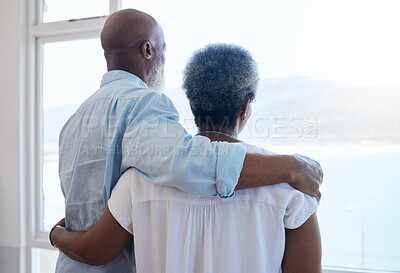 Buy stock photo Shot of a couple looking at view in a house