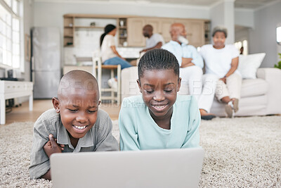 Buy stock photo Shot of a brother and sister using a tablet at home