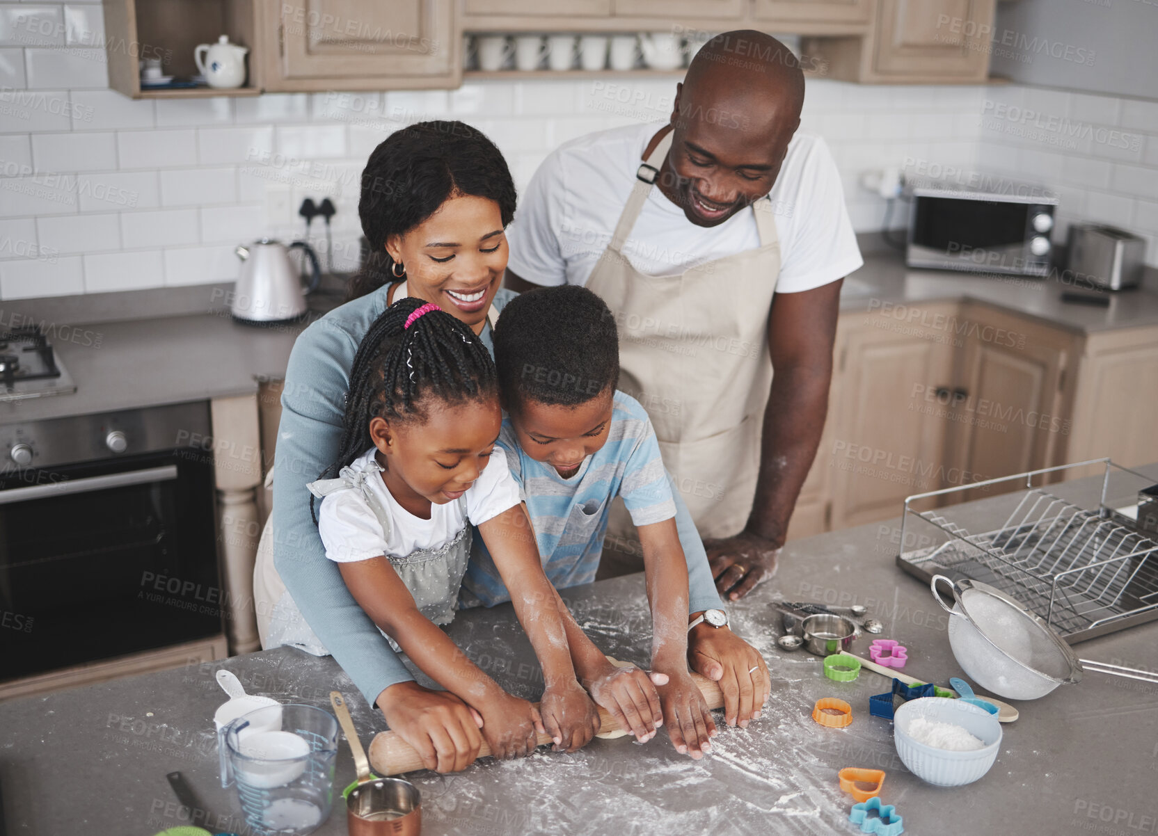 Buy stock photo Rolling pin, baking and black family in kitchen for bonding, learning and skill development in home. Pastry, ingredients and African parents teaching children to cook for growth and fun at house.