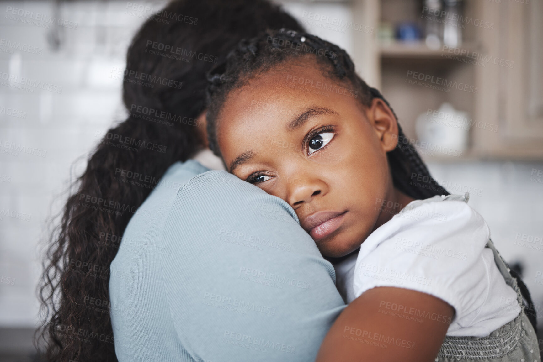 Buy stock photo Black child, tired and mom in home for hug, care and support with love and protection. Young girl, relax and rest on mother for fatigue, relationship development and trust in kitchen with embrace