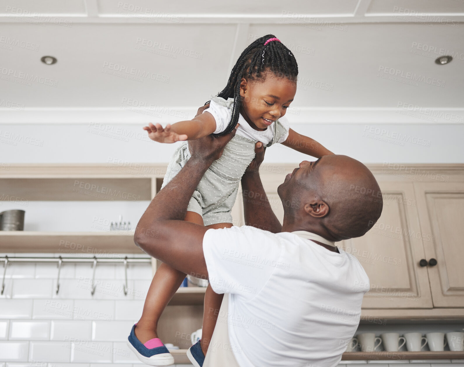 Buy stock photo Game, lift or plane with father and daughter in kitchen of home together for bonding or love. Energy, fantasy and smile of playful girl child with happy single parent man having fun in apartment