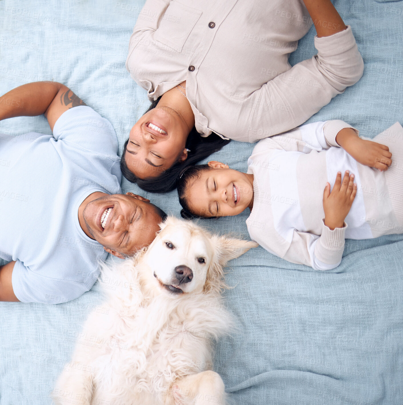 Buy stock photo Above, outdoor and family with dog, kid and parents with love, weekend break and happiness. Outside, mother and father with daughter, animal and relax with pet, time together and comfort with care