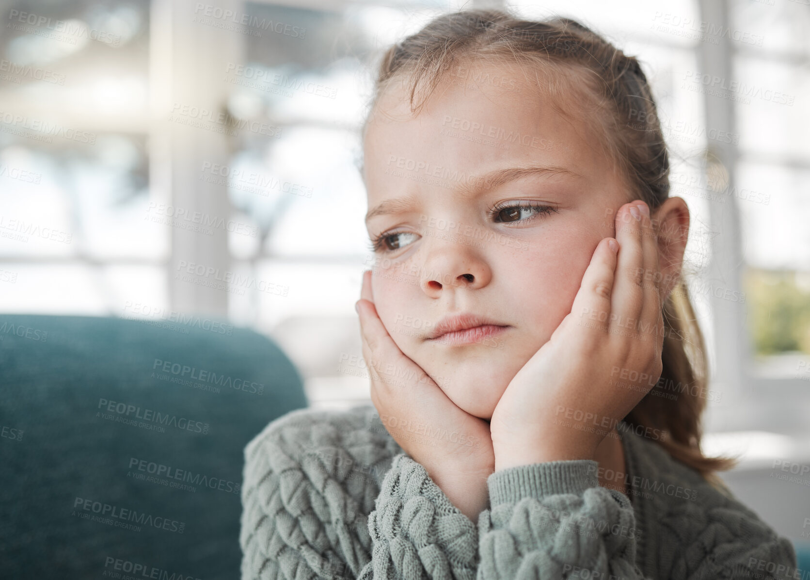 Buy stock photo Girl, thinking and bored in home on sofa by window for daydream, lazy and contemplating on weekend. Female person, autism and thoughtful child in house for free time, loneliness and adhd with vision