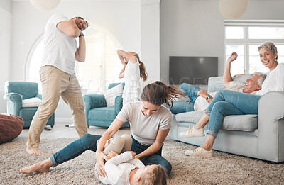 Buy stock photo Family, children and playing on floor in living room for funny games, love and support on weekend. Happy, mother and father bonding with kids on carpet at home for humor, joke and laughing together