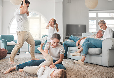 Buy stock photo Parents, children and playing on floor in living room for funny games, joke and support on weekend. Happy, father and mother bonding with kids on carpet at home for humor, love and laughing together