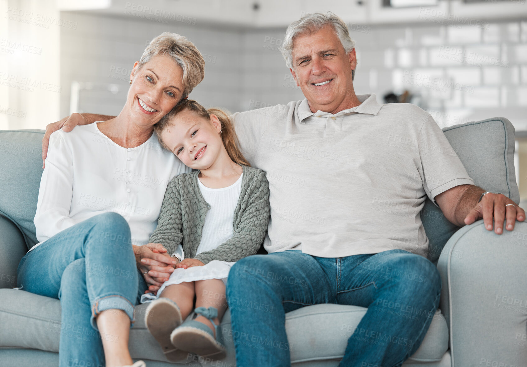 Buy stock photo Happy, sofa and portrait of kid with grandparents in home for bonding, connection and family time. Smile, love and girl child relax with senior man and woman in living room at house in Australia.