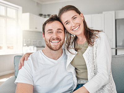 Buy stock photo Happy couple, portrait and relax with hug on sofa for love, care or support together at home. Young man and woman with smile for embrace, comfort or bonding on couch for holiday or weekend at house