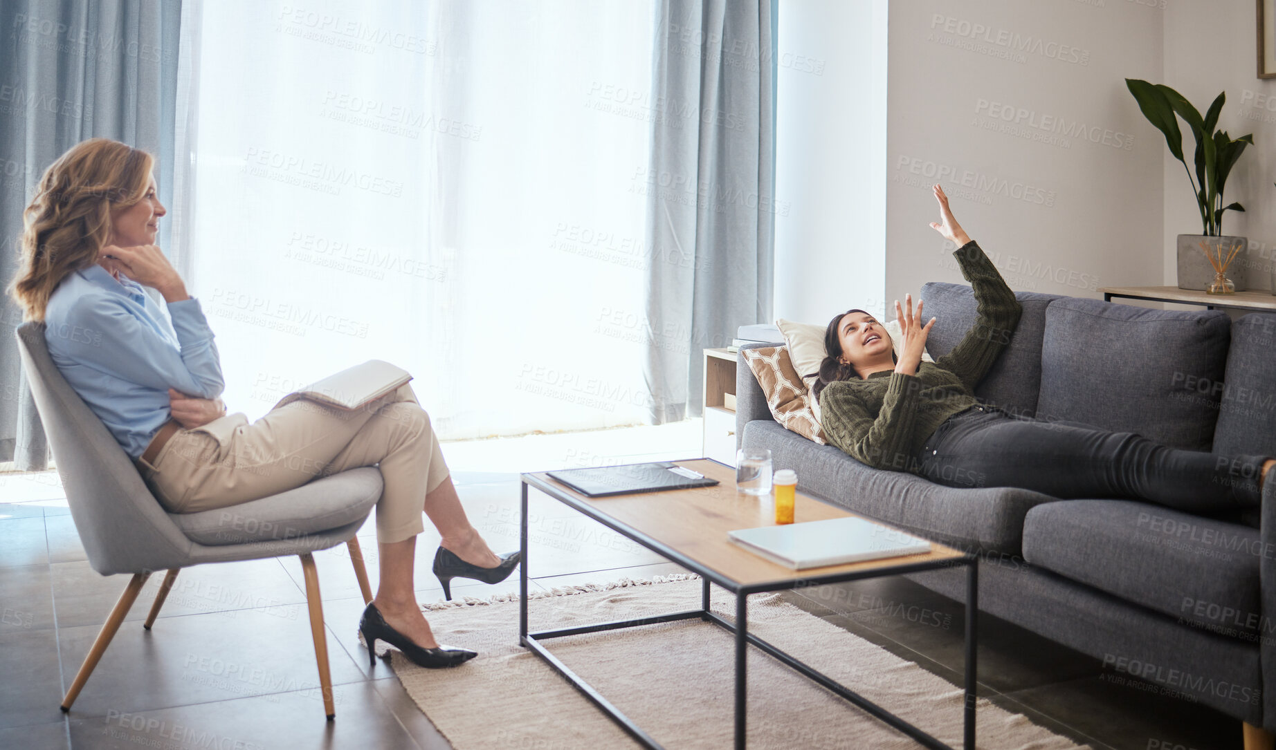 Buy stock photo Psychologist, woman and patient on sofa for medical support, anxiety risk and talking of trauma. Counseling, doctor listening and consultation on couch for mental health, depression and ptsd