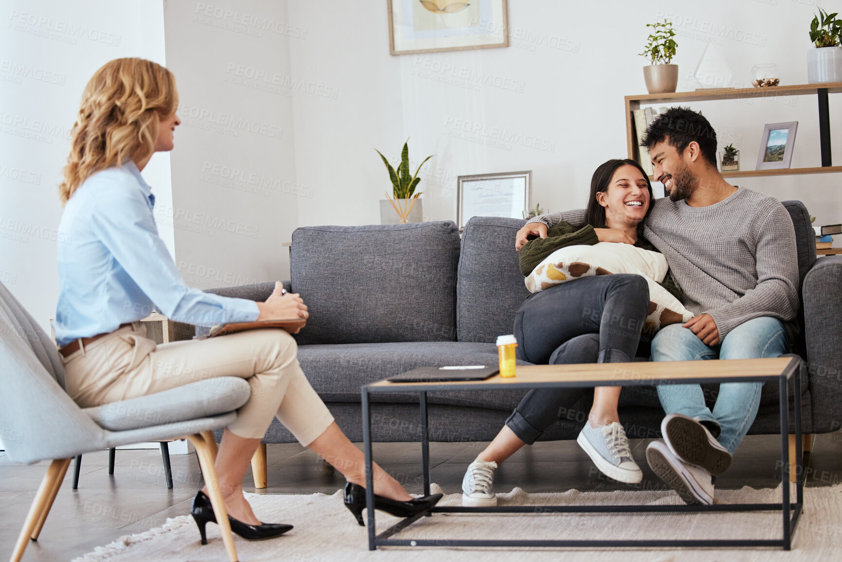 Buy stock photo Shot of a happy couple at a therapy session