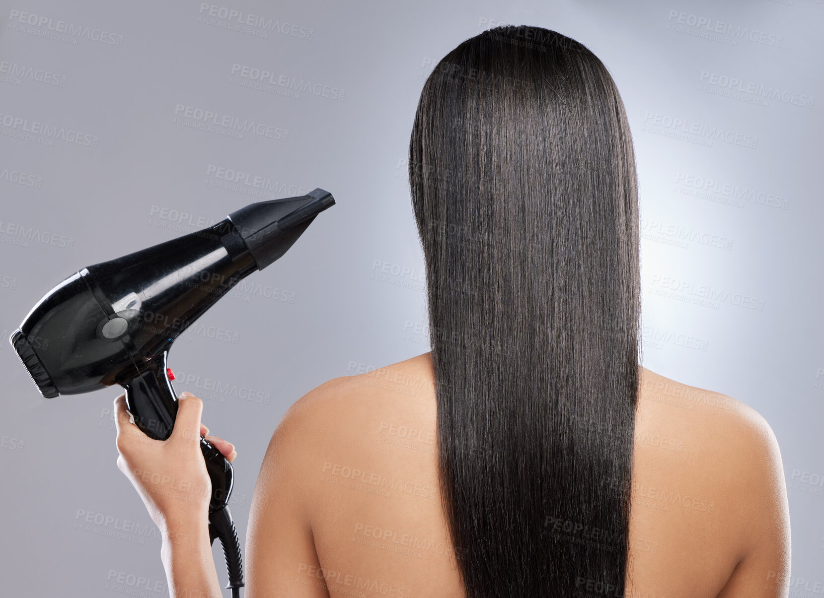 Buy stock photo Girl, back and hairdryer in studio for hair grooming or styling, haircare and beauty routine for wellness or keratin treatment. Woman, tool and isolated on white background for result, shine and glow